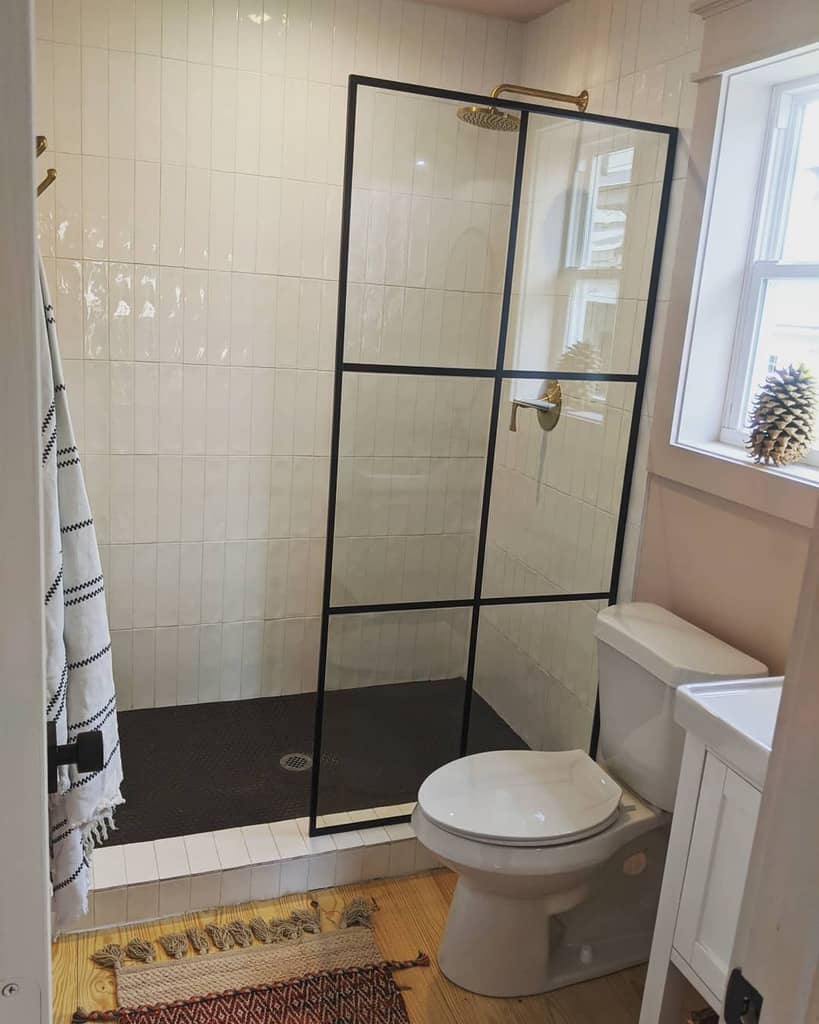 Glass partition doorless walk in shower