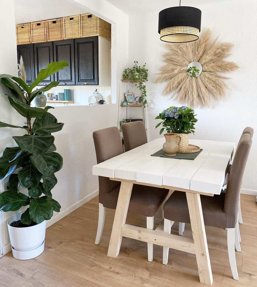 White dining room with natural accents and greenery