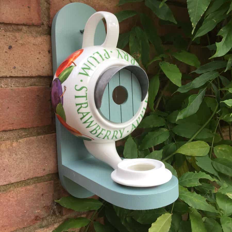 Repurposed teapot birdhouse 