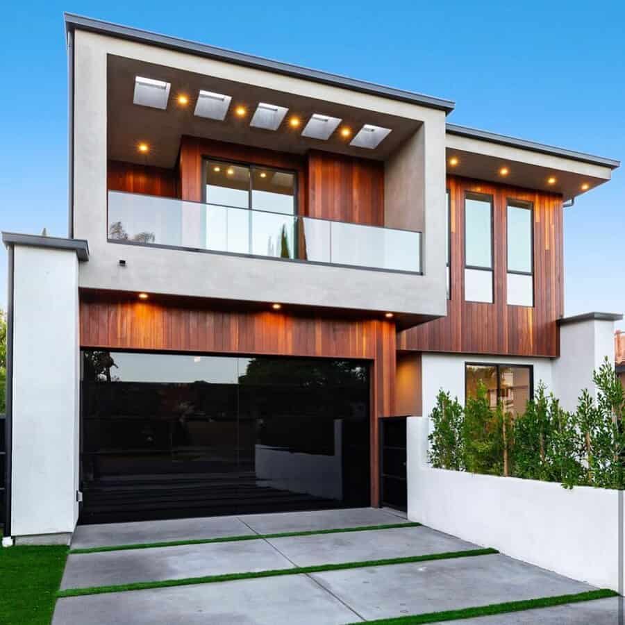 Contemporary house with dark reflective garage door