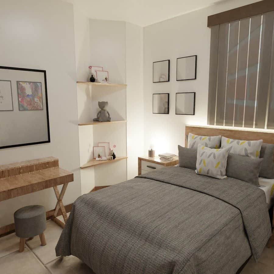 Cozy bedroom with gray bedding and wall art