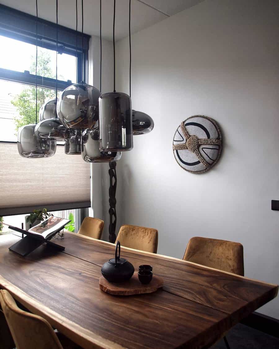 Contemporary dining with unique glass chandelier