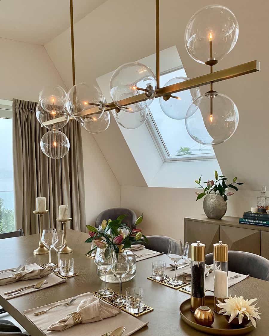 Chic dining area with bubble glass chandelier and skylight