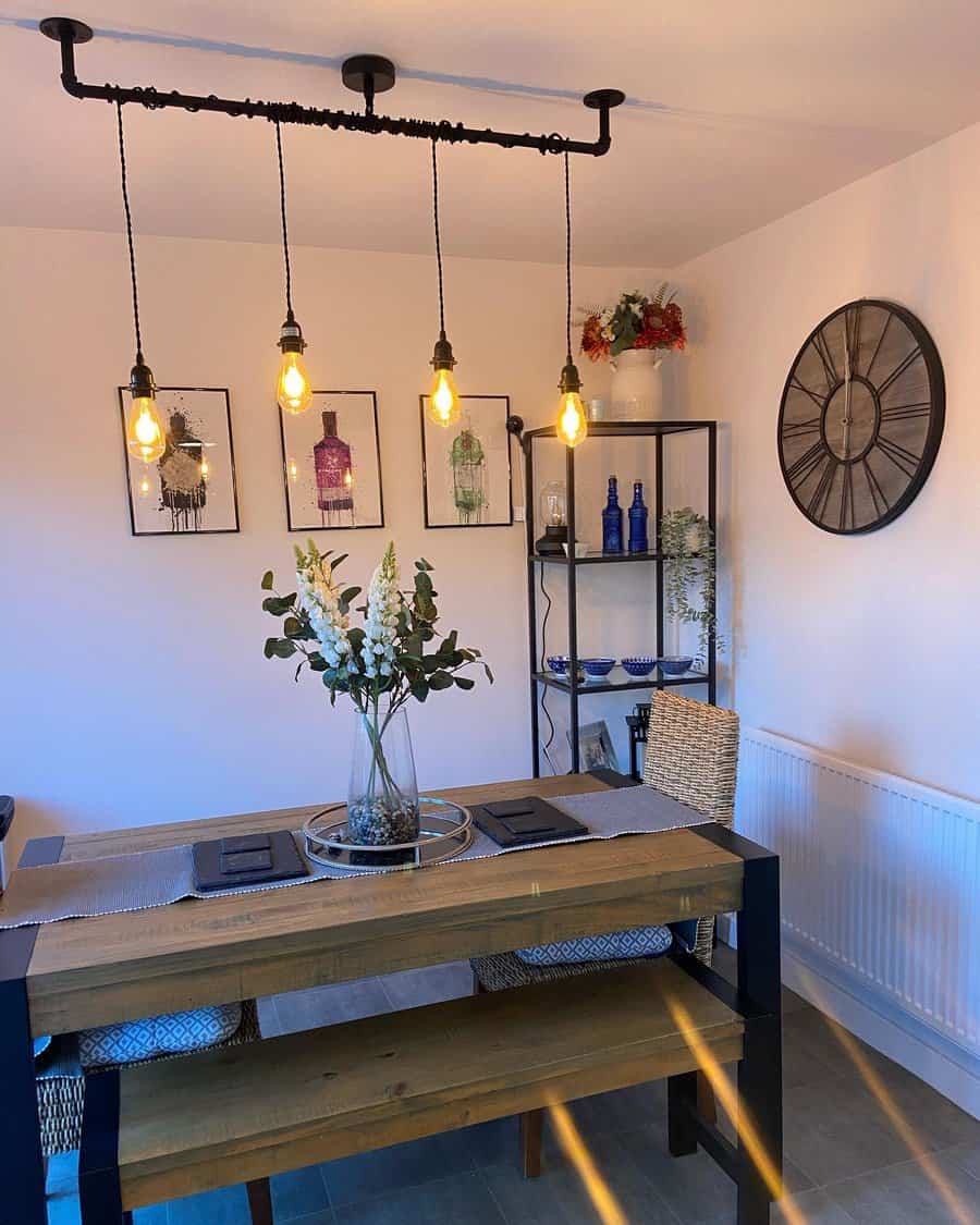 Rustic dining room with industrial pipe lighting and decor