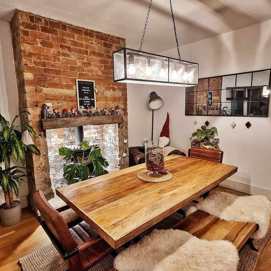 Cozy dining area with hanging industrial light