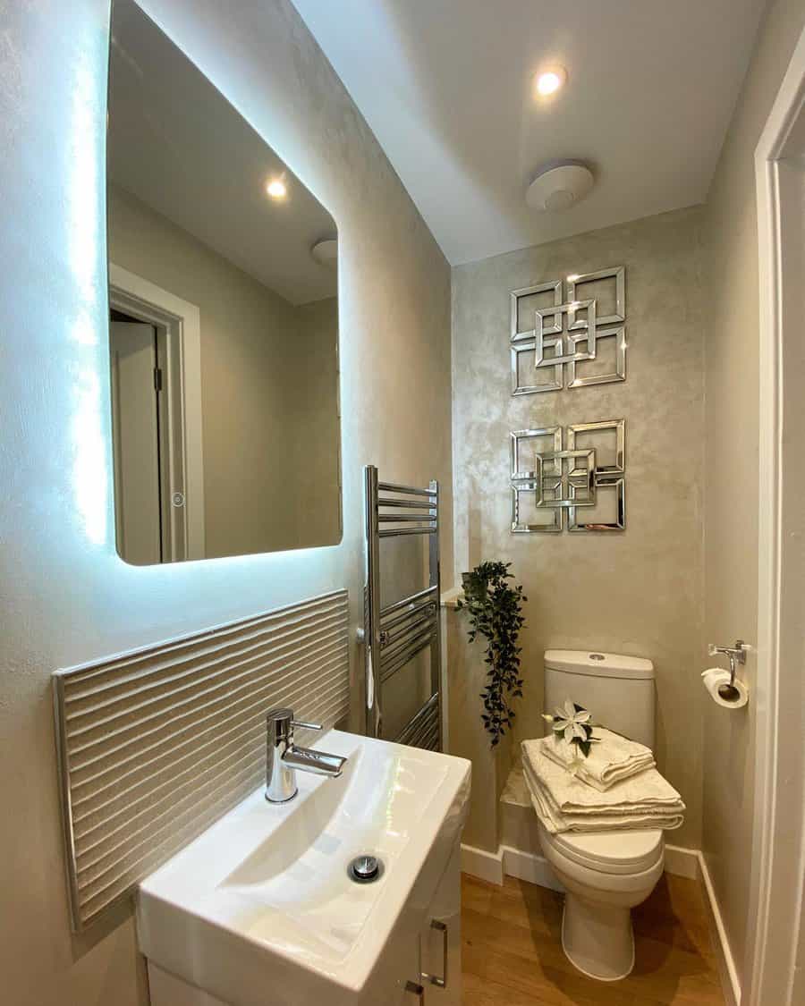 Beige bathroom with LED mirror