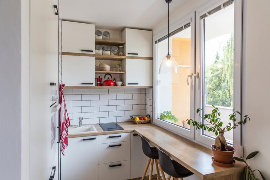 Apartment Tiny Kitchen Ideas 2 Bright kitchen corner with subway tiles and wooden table
