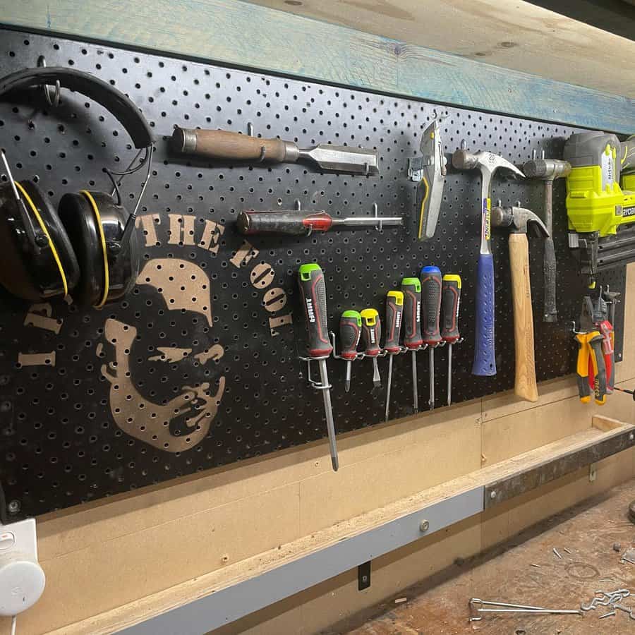 Metal peg board with graphic
