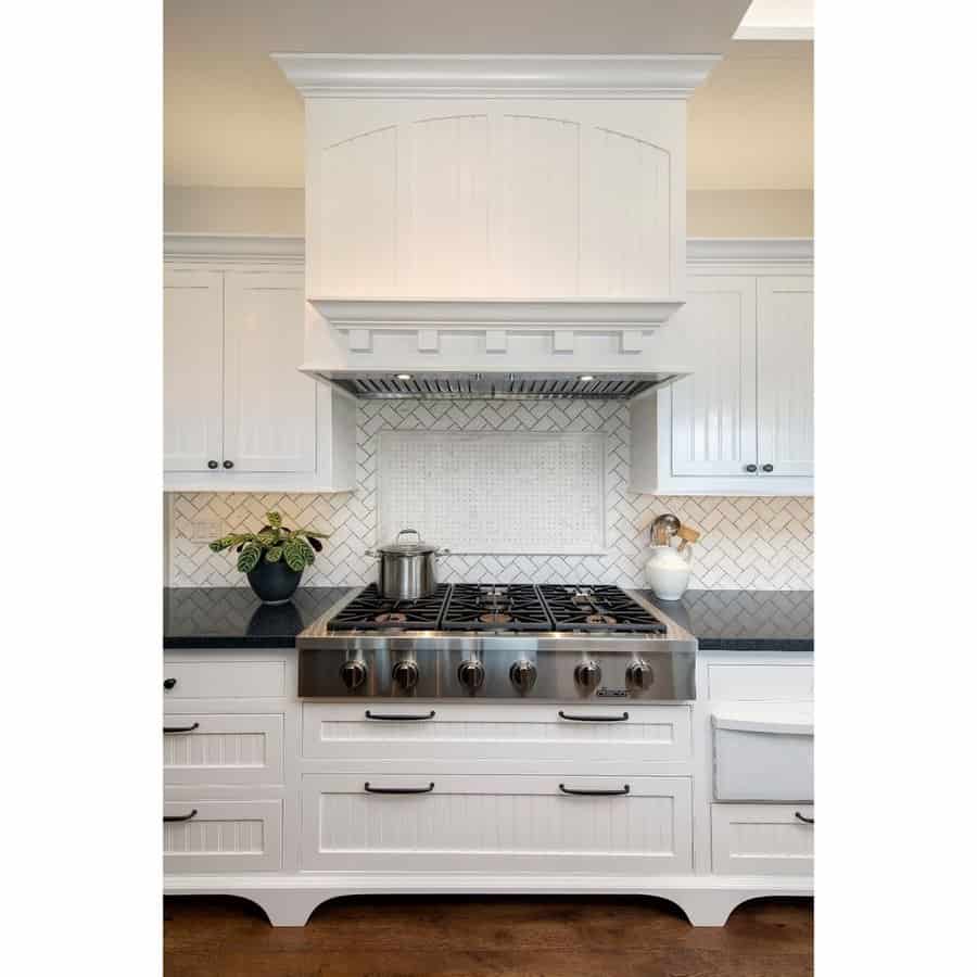 White beadboard kitchen cabinets