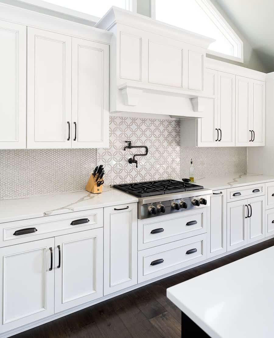 White cabinets with black handles