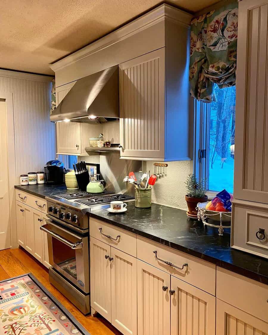 White beadboard kitchen cabinets