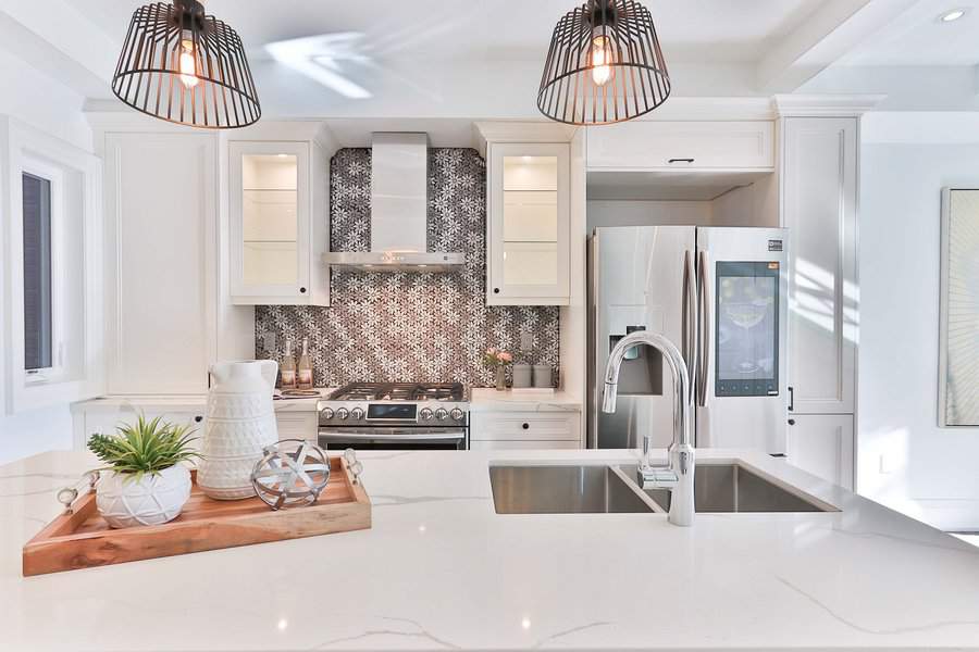 White cabinets with marble countertop