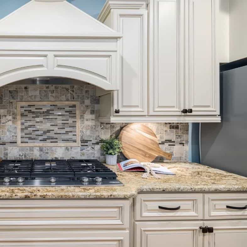 Vintage style white kitchen cabinets