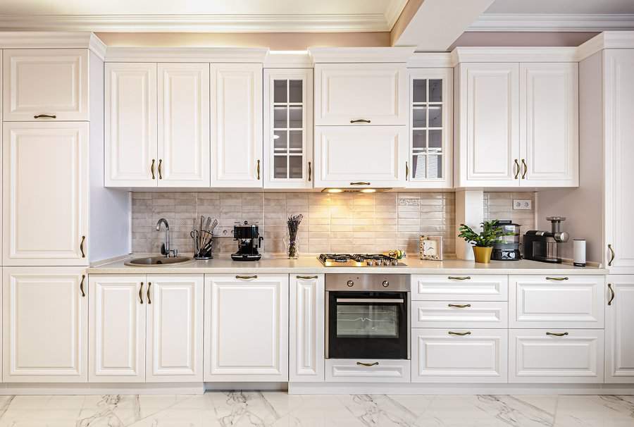 Vintage style white kitchen cabinets