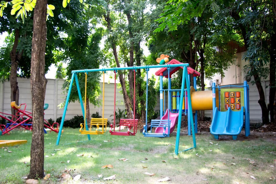 Colorful playground equipment in a green park