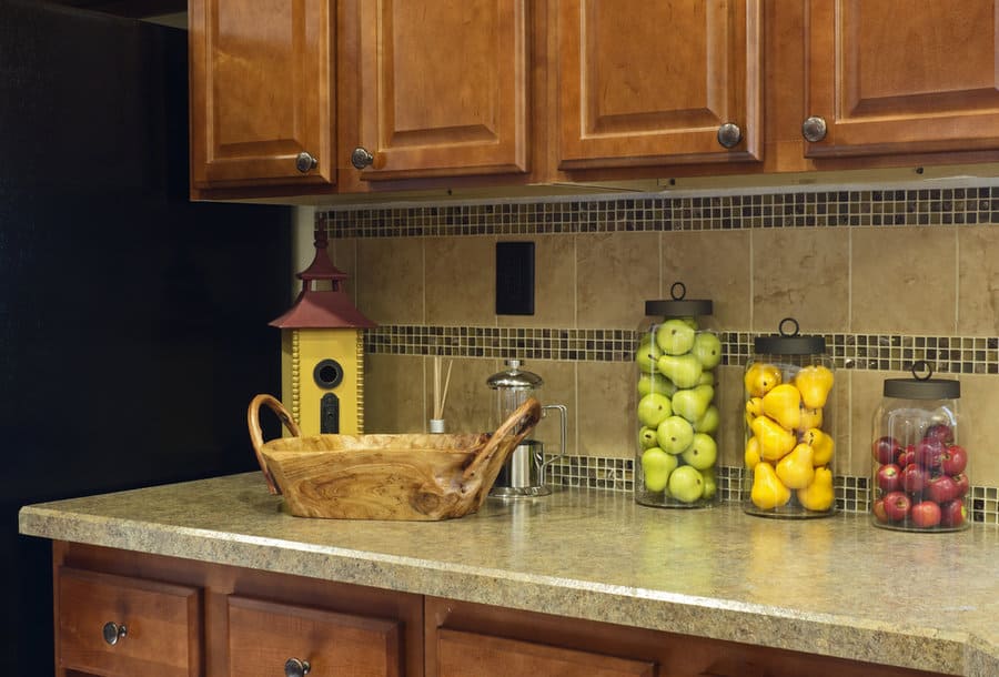 jars with fruits on a kitchen counter
