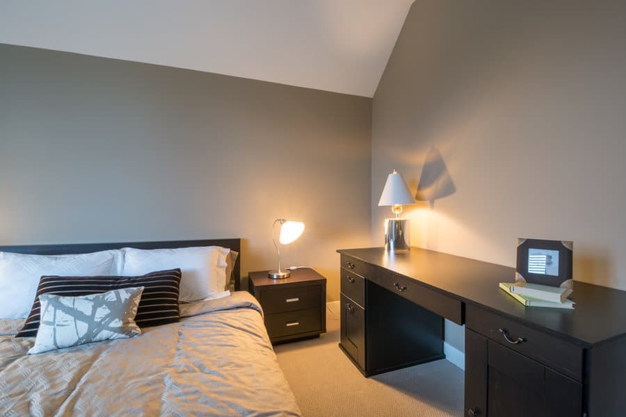 Bedroom with desk and lamp
